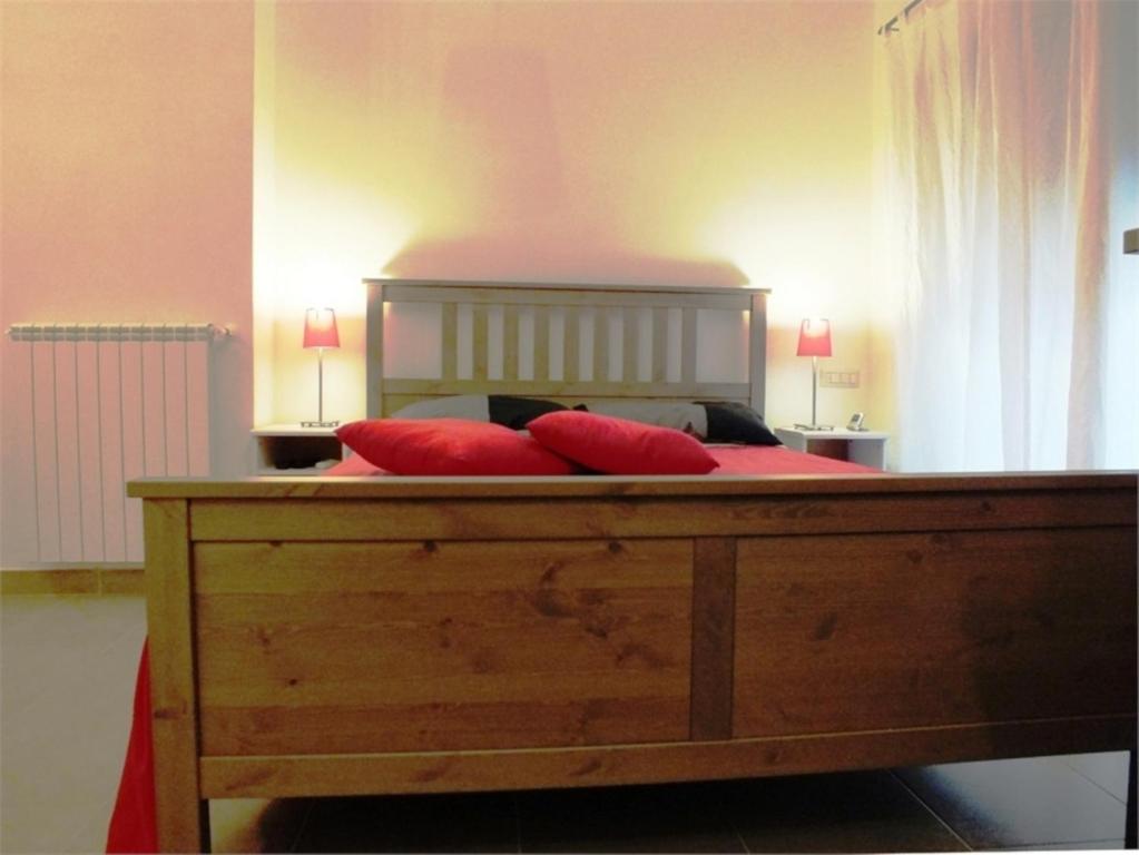 Cama o camas de una habitación en Romantic Holiday Rome B&B