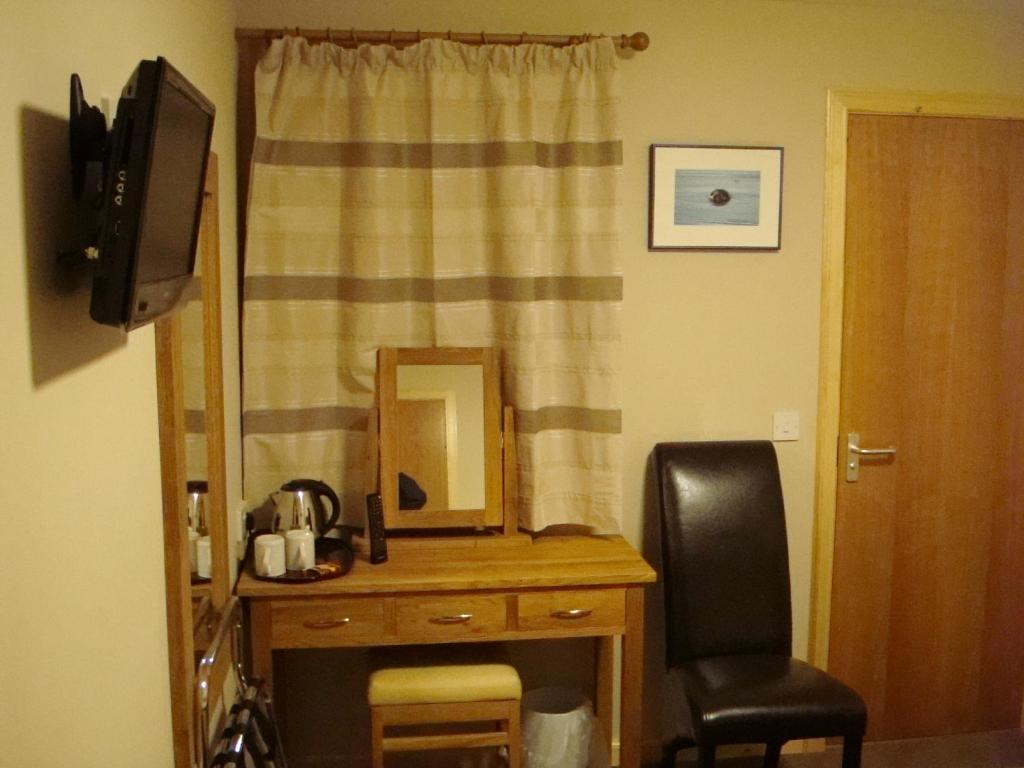 TV o dispositivi per l'intrattenimento presso Seaview John O Groats Hotel