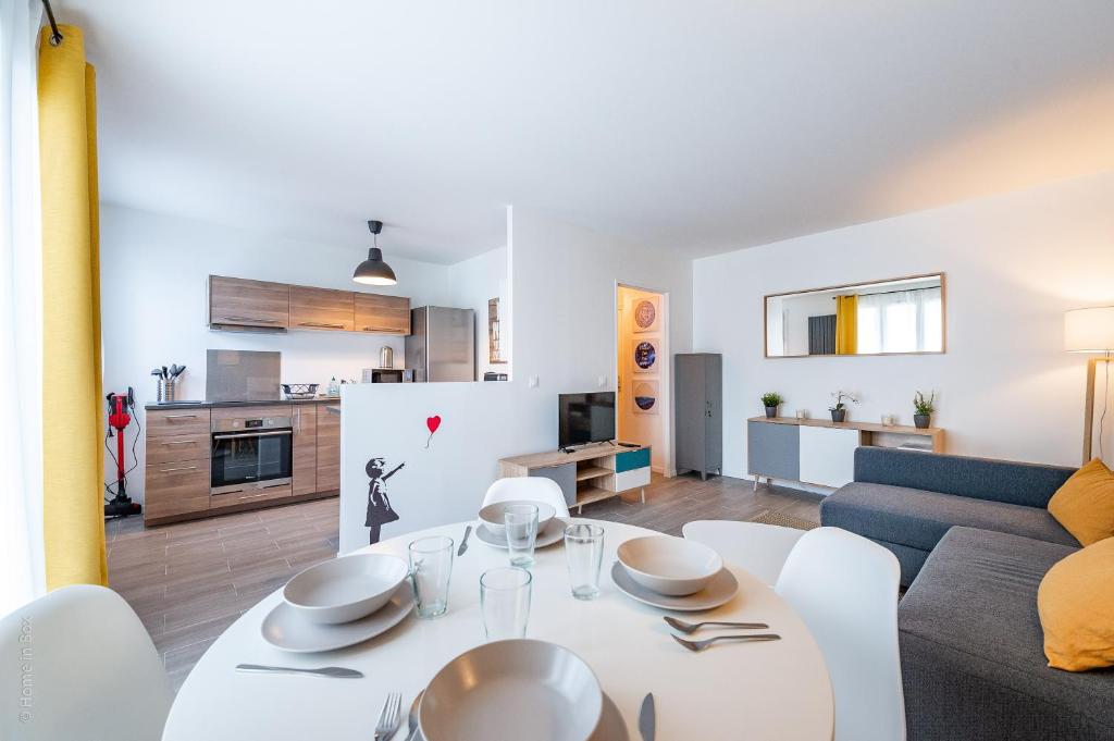 Η κουζίνα ή μικρή κουζίνα στο Magnifique Appartement proche gare - 8min Disney