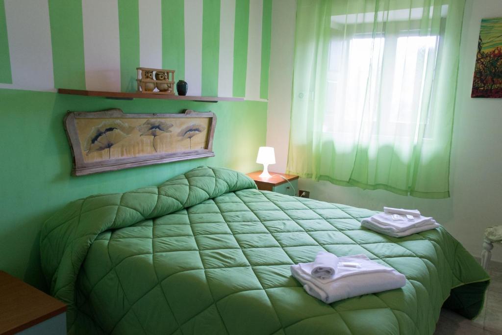 Posteľ alebo postele v izbe v ubytovaní Country House Maremma Nel Tufo