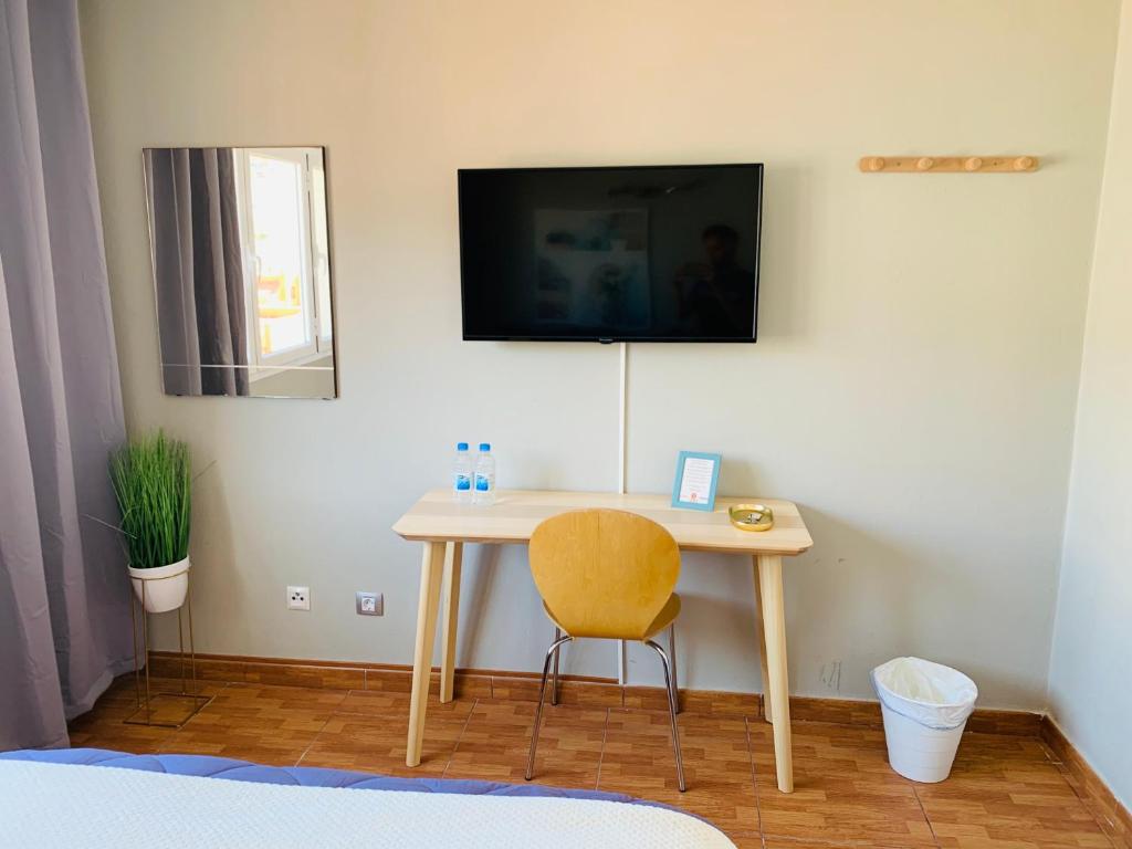 TV a/nebo společenská místnost v ubytování BYOR City Rooms