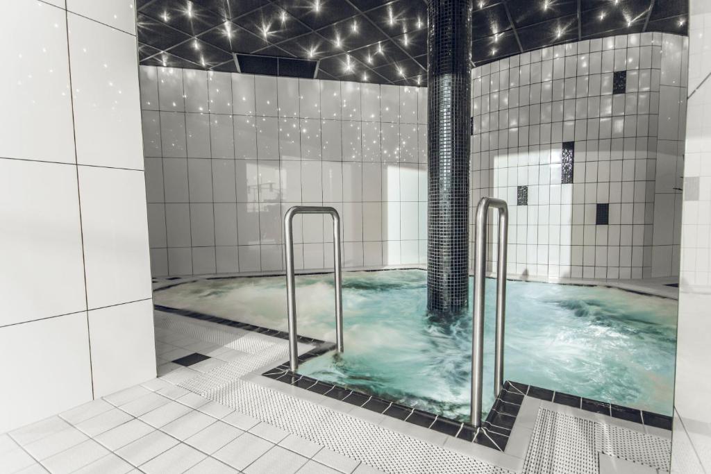 Koupelna v ubytování Braavo Spa Hotel
