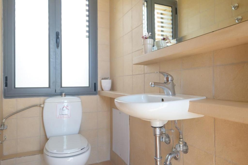 Kúpeľňa v ubytovaní Trochalo Villas