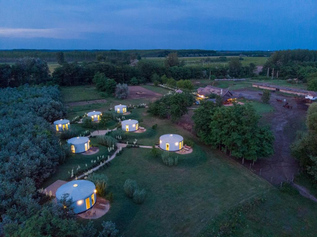 an aerial view of an estate with domes at Homoki Lodge - Nature Quest Resort - Adult Only in Ruzsa