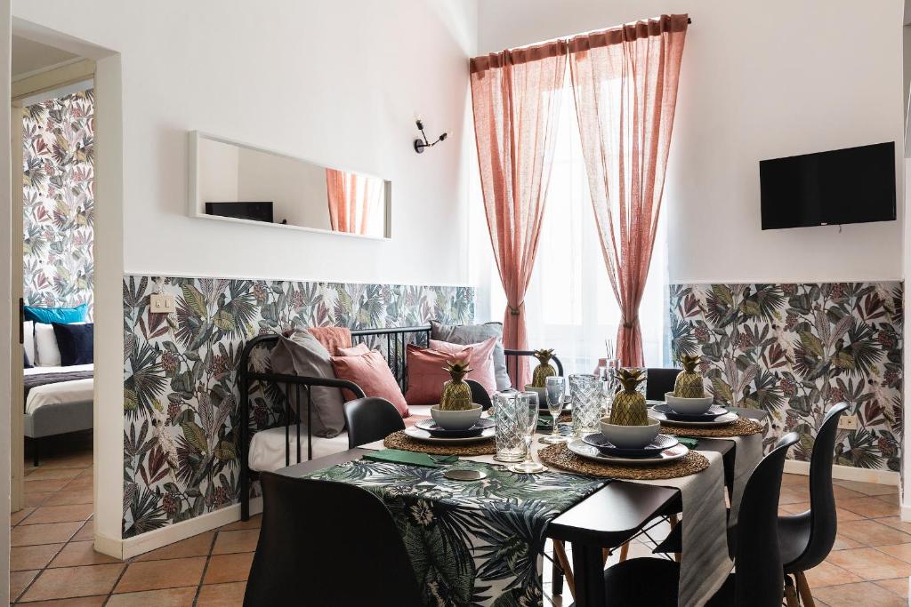 Televízia a/alebo spoločenská miestnosť v ubytovaní Gianicolo Jungle Apartment - Onofrio