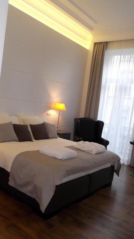 Postel nebo postele na pokoji v ubytování Art de Sejour - B&B