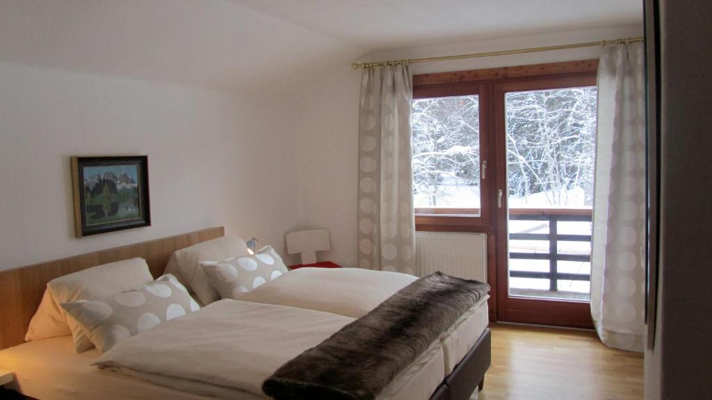 Posteľ alebo postele v izbe v ubytovaní Chalet Berghof
