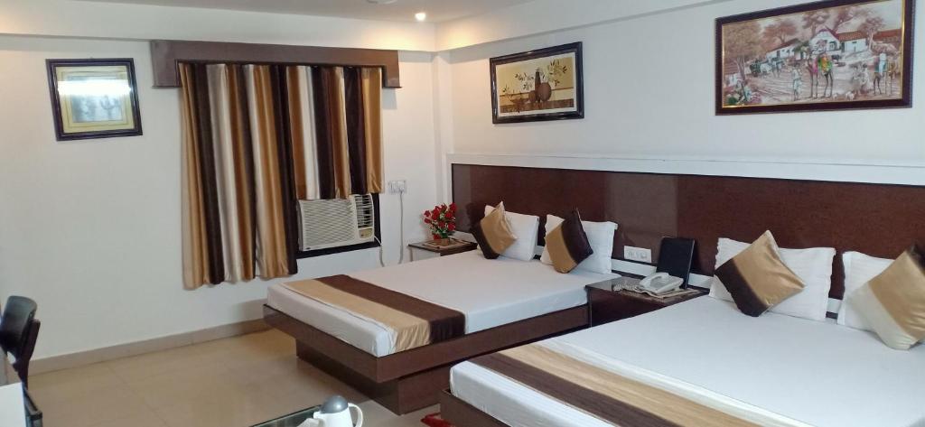 Cama o camas de una habitación en Hotel Su Shree Continental 5 Minutes Walk From New Delhi Railway Station