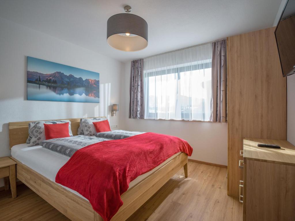 Łóżko lub łóżka w pokoju w obiekcie Appartement Strasser