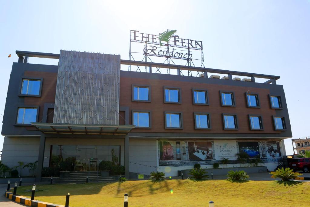 a building with a sign on top of it at The Fern Residency Mundra in Mundra