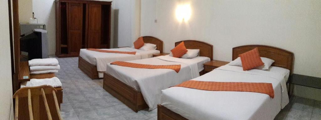 Postel nebo postele na pokoji v ubytování Kata View Guest House