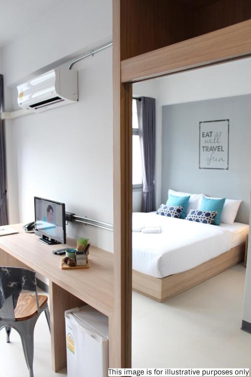 Postel nebo postele na pokoji v ubytování Rajthani Hotel - SHA Certified