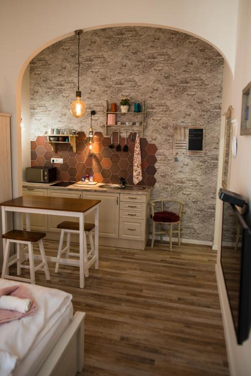 Kuchyňa alebo kuchynka v ubytovaní All In Apartman IV.
