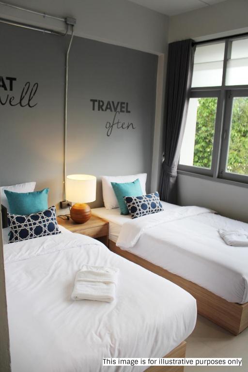 Postel nebo postele na pokoji v ubytování Rajthani Hotel - SHA Certified