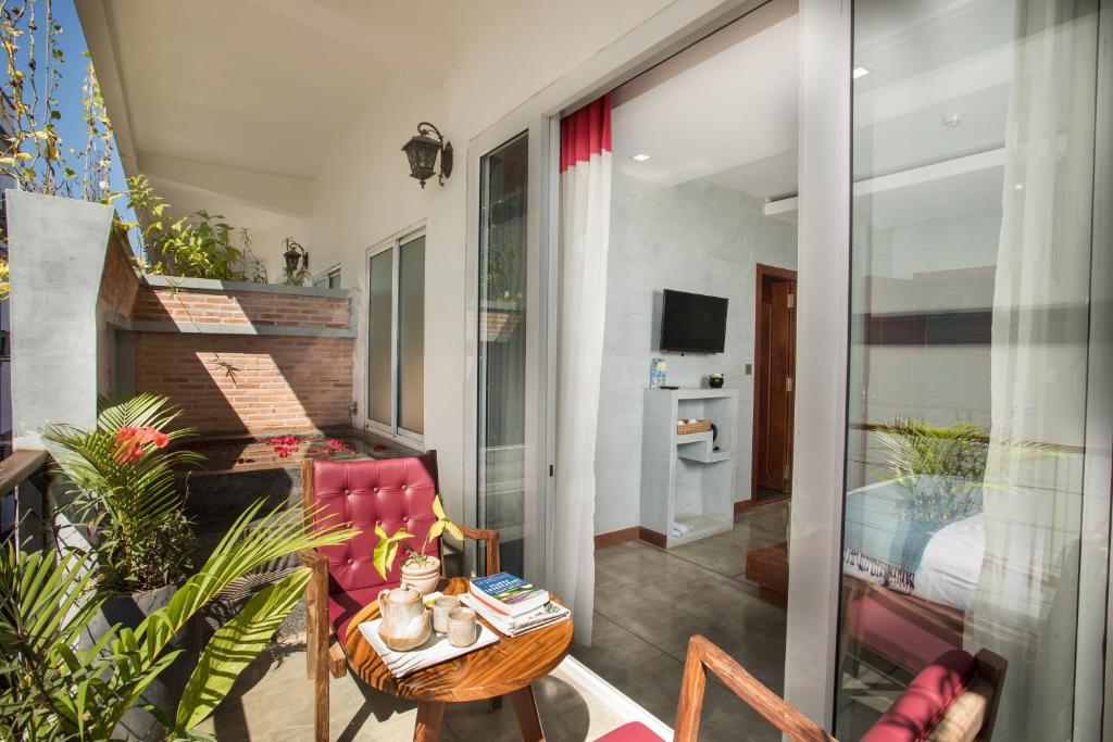 TV a/nebo společenská místnost v ubytování Cambana Residence