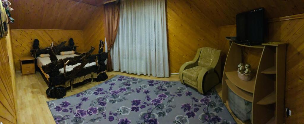 Postel nebo postele na pokoji v ubytování Pid Yavorom