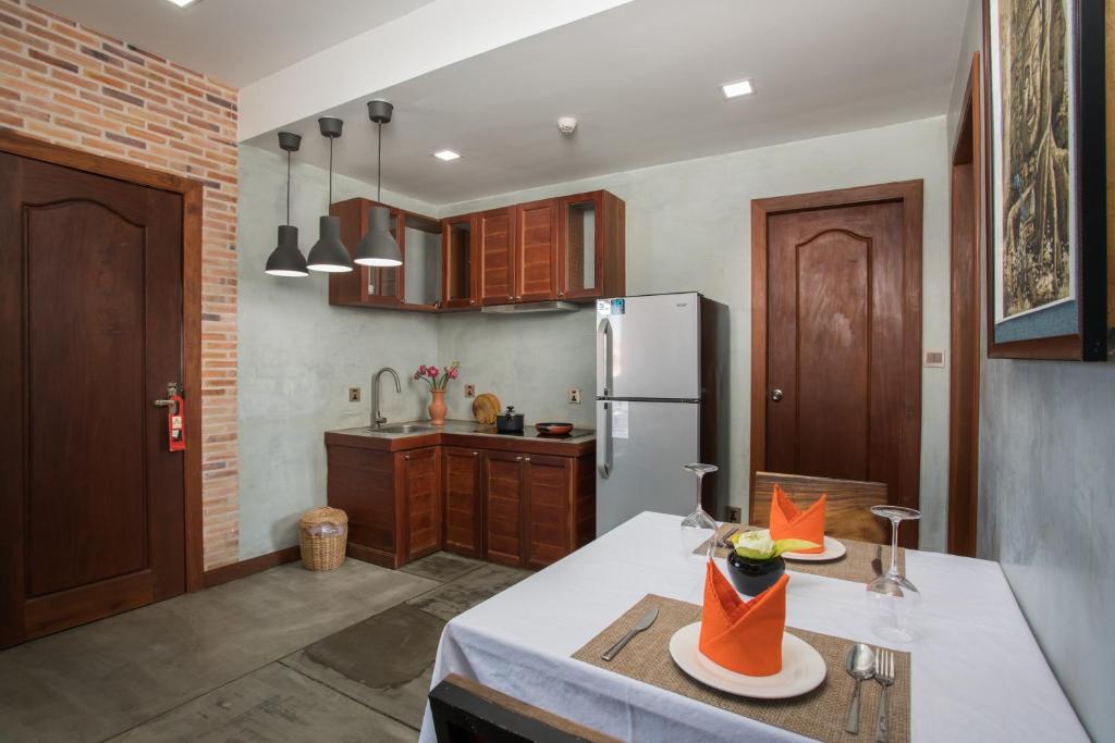 Kuchyň nebo kuchyňský kout v ubytování Cambana Residence