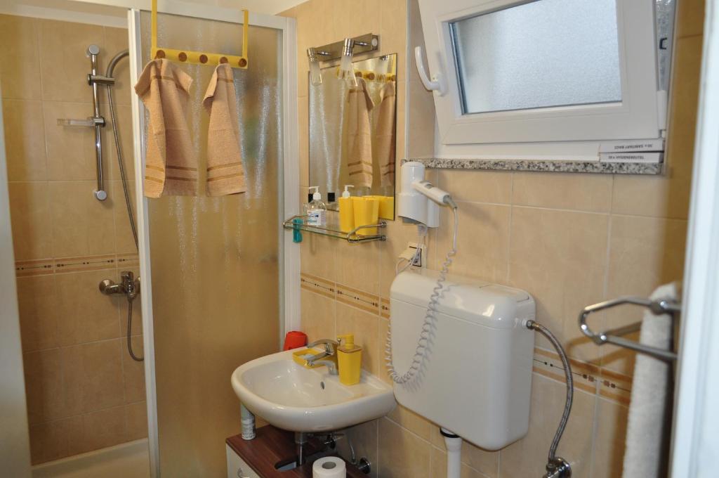 Kúpeľňa v ubytovaní MZ Apartment