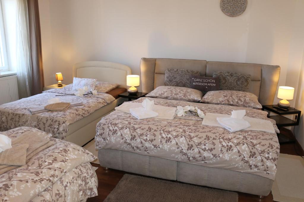 Postel nebo postele na pokoji v ubytování Villa Schloss
