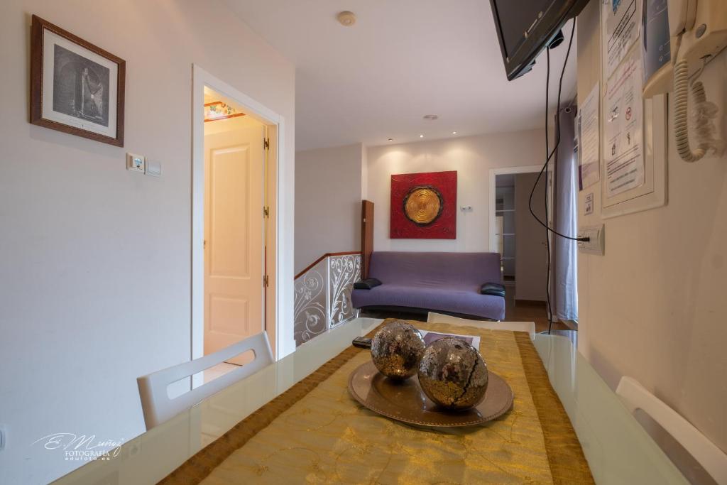 A seating area at Apartamentos Mérida Center