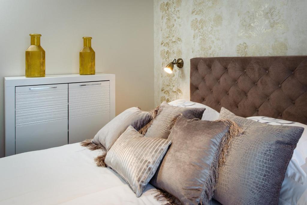 Posteľ alebo postele v izbe v ubytovaní Boban Luxury Suites