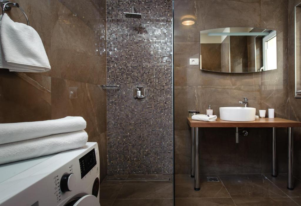 Kúpeľňa v ubytovaní Boban Luxury Suites