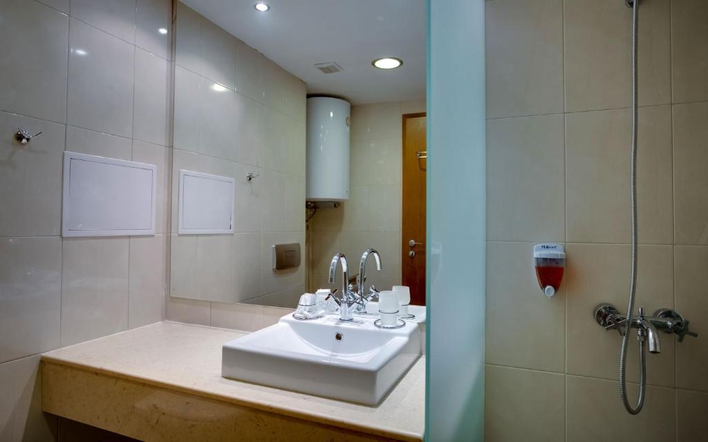 Koupelna v ubytování Effect Malina Residence Hotel
