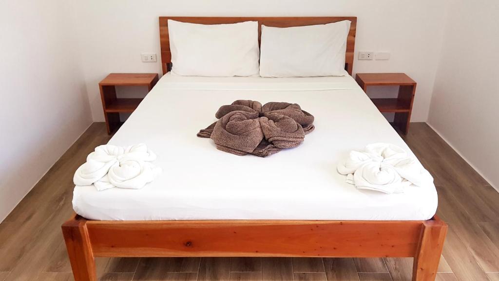Postel nebo postele na pokoji v ubytování Positano Alona Beach Panglao