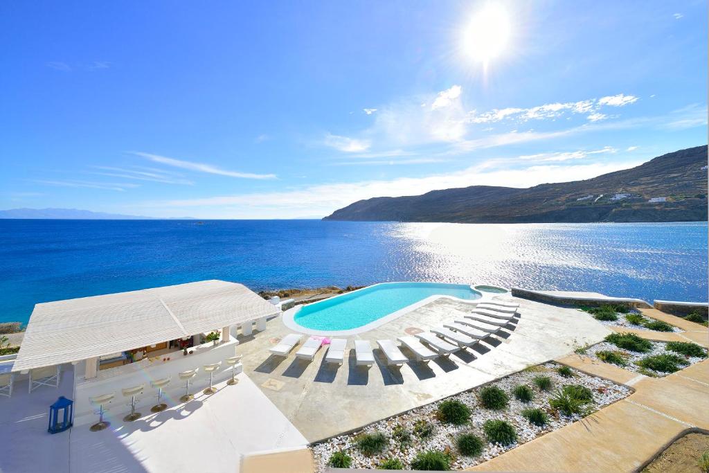 an aerial view of a resort with a swimming pool at Mykonos Pantheon in Kalo Livadi