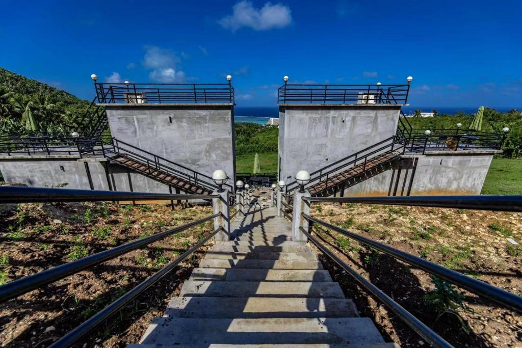 a view from the bottom of a gate at a power plant at Saipan Skyline Designers Hotel in Saipan