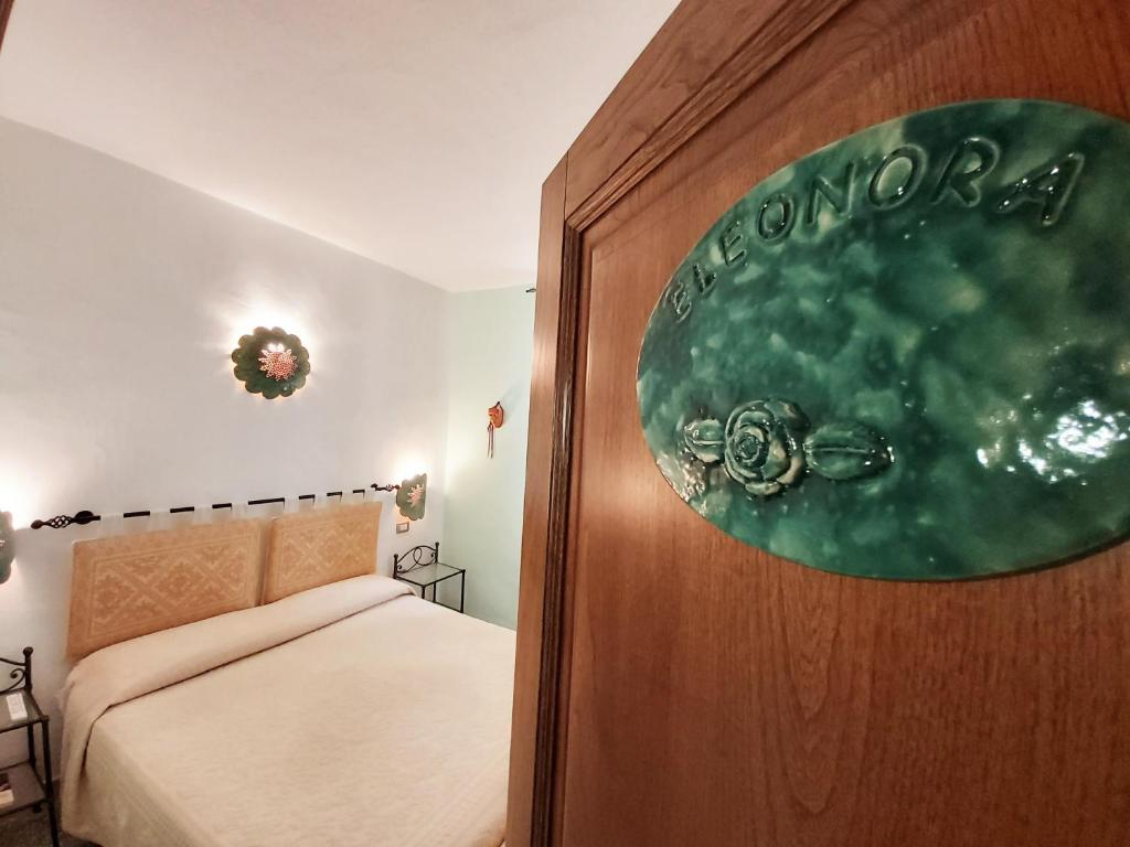 Postel nebo postele na pokoji v ubytování Al Vecchio Corso B&B