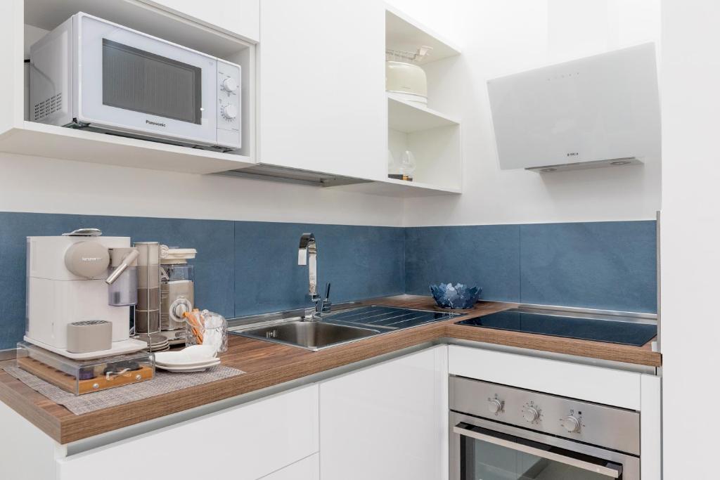 A kitchen or kitchenette at Romantic Suite