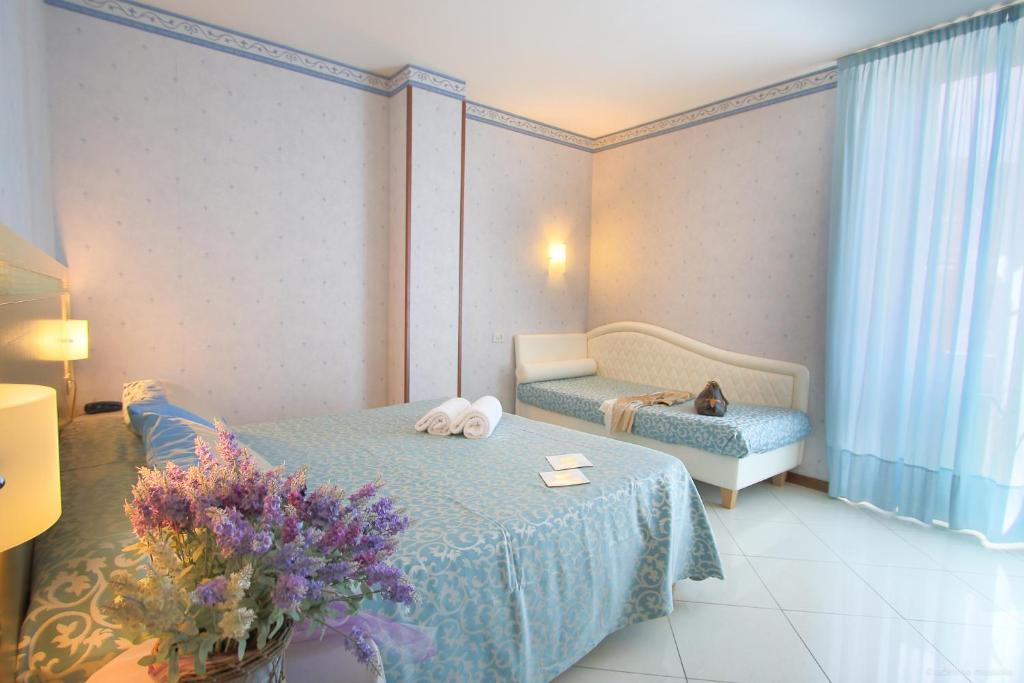 Posteľ alebo postele v izbe v ubytovaní Hotel Nazionale
