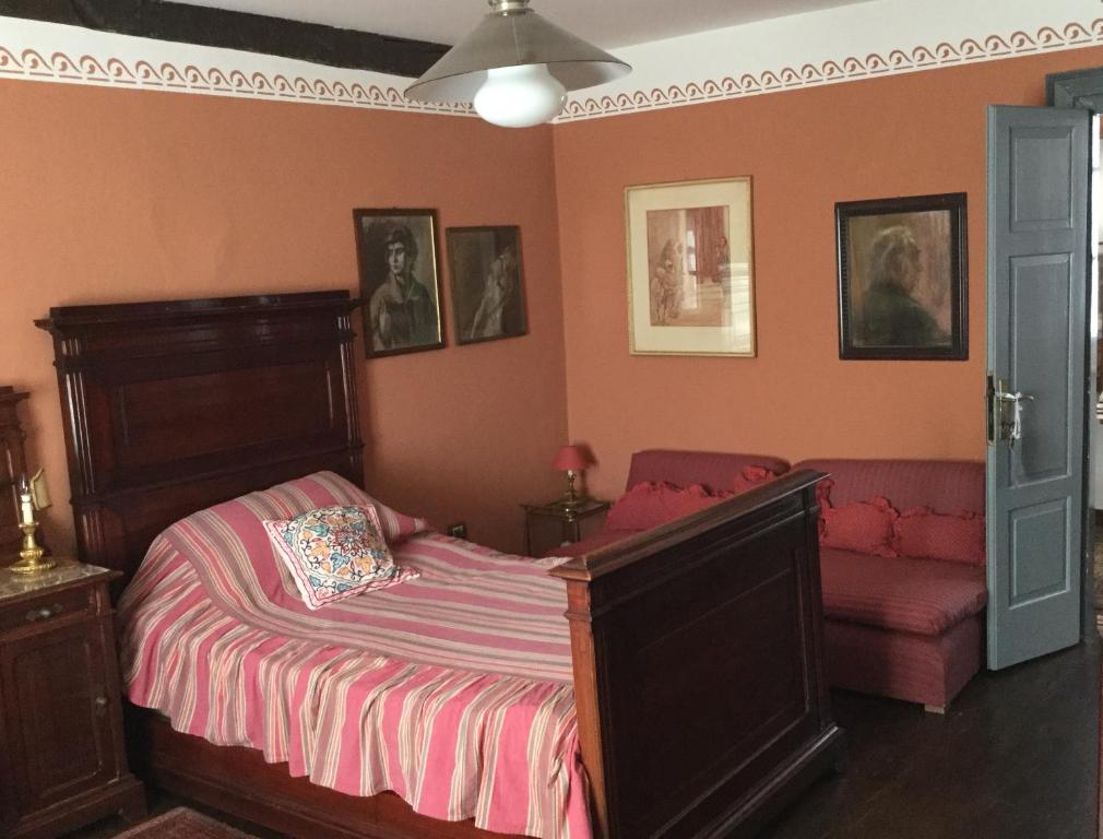 Ένα ή περισσότερα κρεβάτια σε δωμάτιο στο Casa Ariis