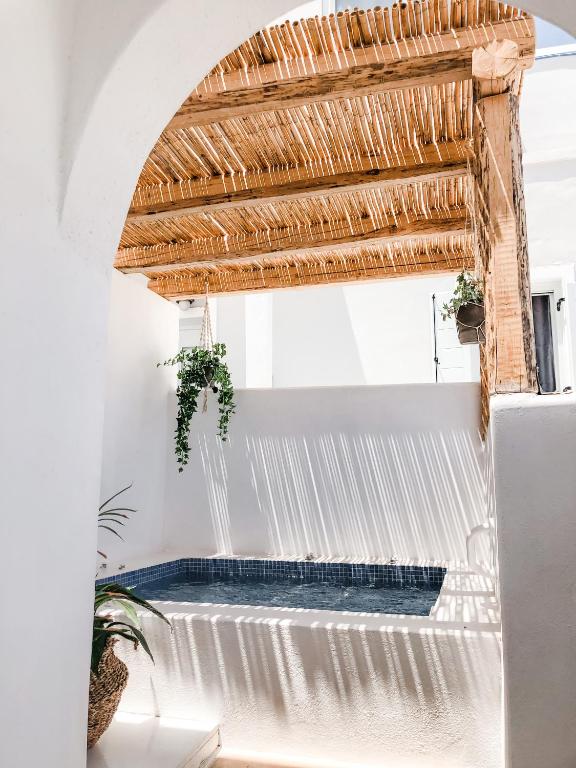 a water feature in the kitchen of a house at Elkaza Villas in Fira