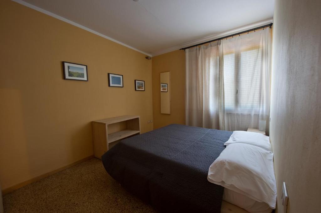 Postel nebo postele na pokoji v ubytování Borgo San Donino