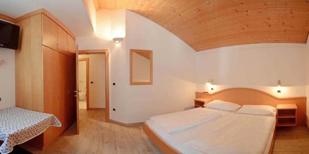 Łóżko lub łóżka w pokoju w obiekcie Casa Roder by Garni Snaltnerhof