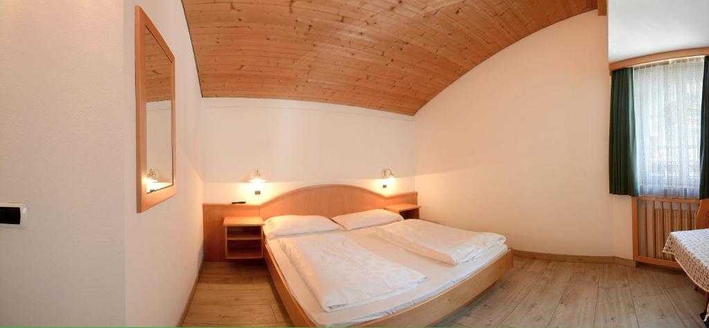 Łóżko lub łóżka w pokoju w obiekcie Casa Roder by Garni Snaltnerhof