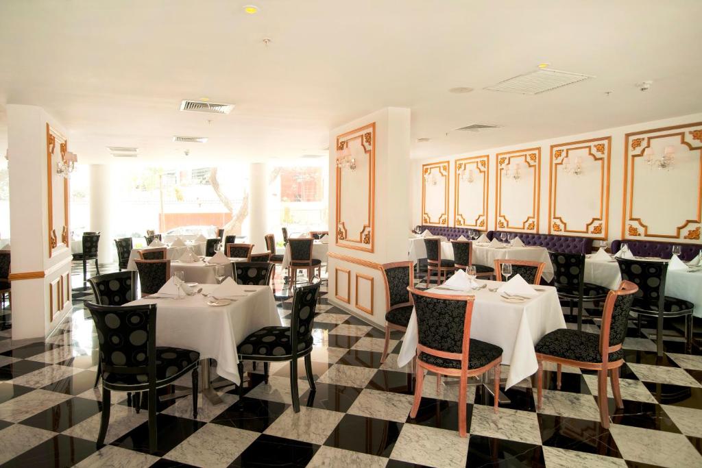 Restaurant o iba pang lugar na makakainan sa NM Lima Hotel