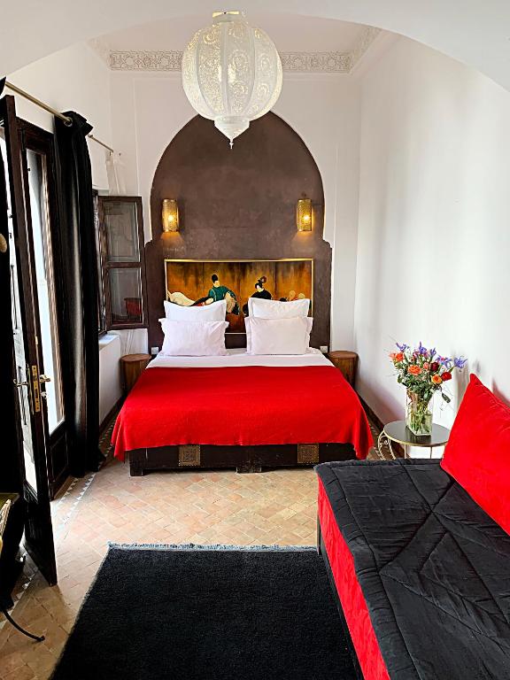 Postel nebo postele na pokoji v ubytování Riad Dar Massai