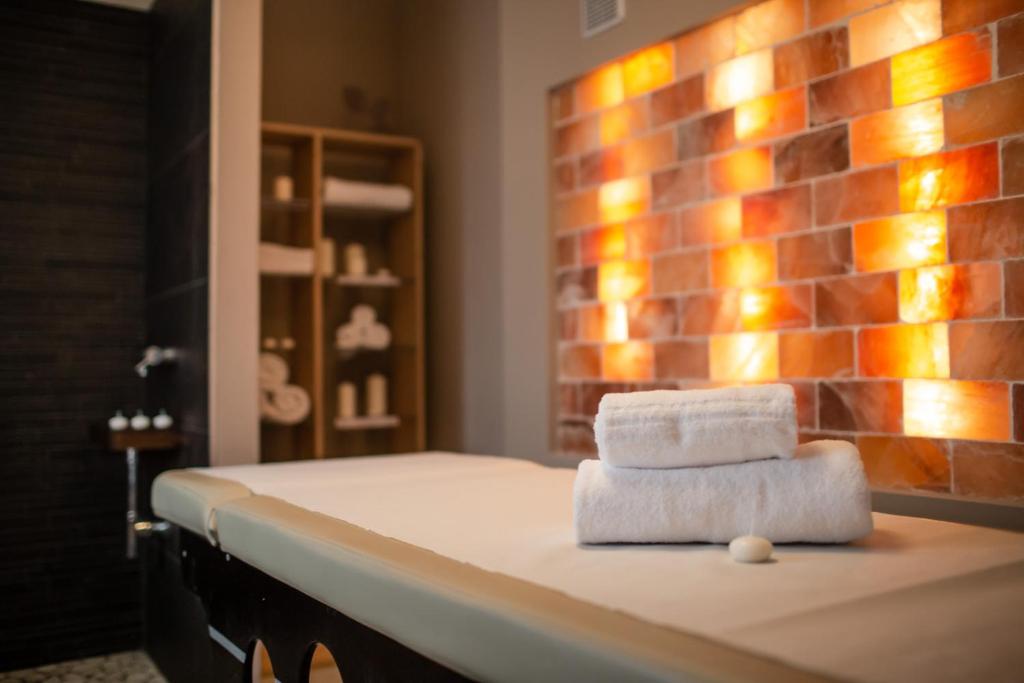 Postel nebo postele na pokoji v ubytování Hotel Ambassador
