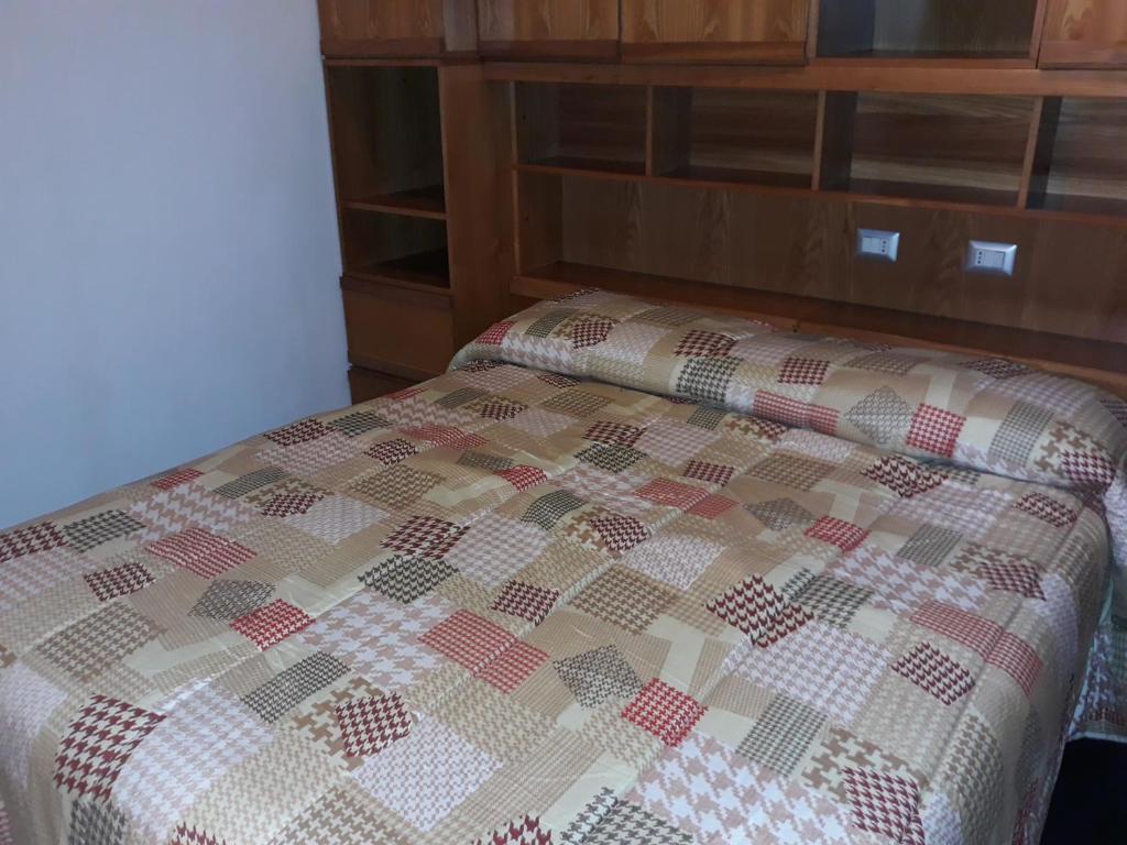 Postel nebo postele na pokoji v ubytování B&B Il Brigante