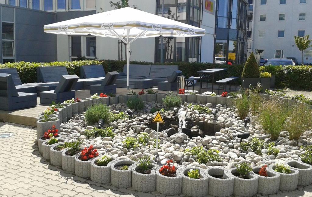 Zahrada ubytování Holiday Inn Express München Messe by IHG