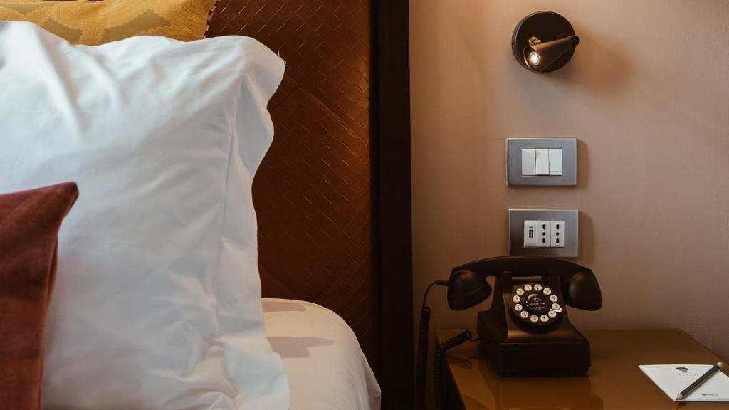 Postel nebo postele na pokoji v ubytování Hotel Indigo Venice - Sant'Elena by IHG