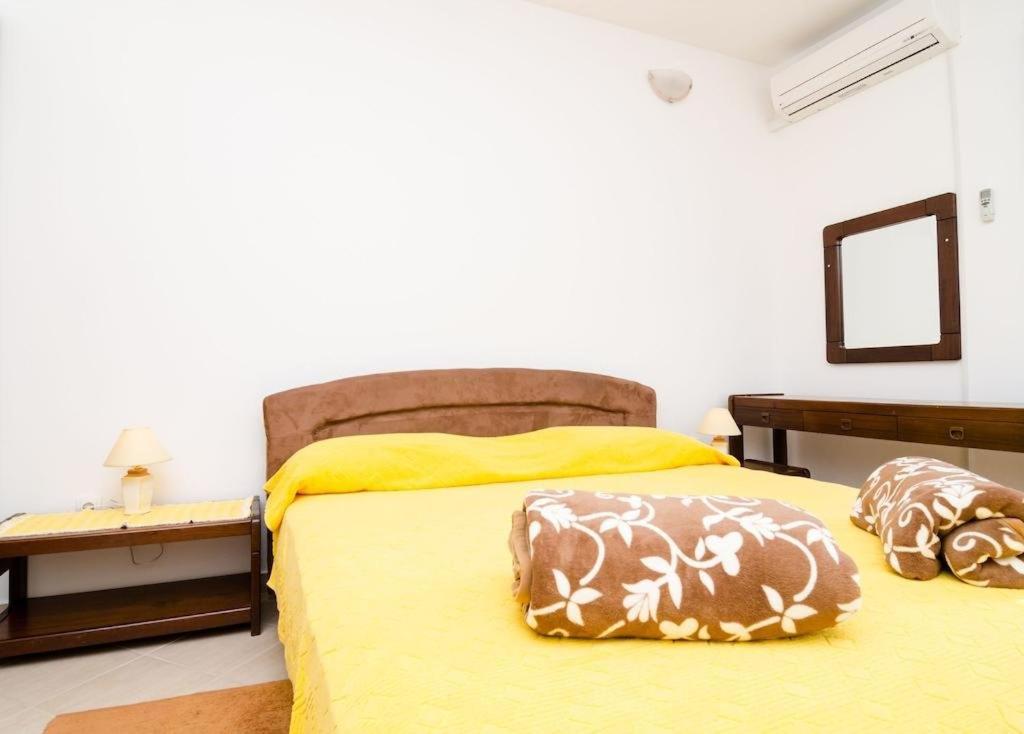 Łóżko lub łóżka w pokoju w obiekcie Apartments Lampalo