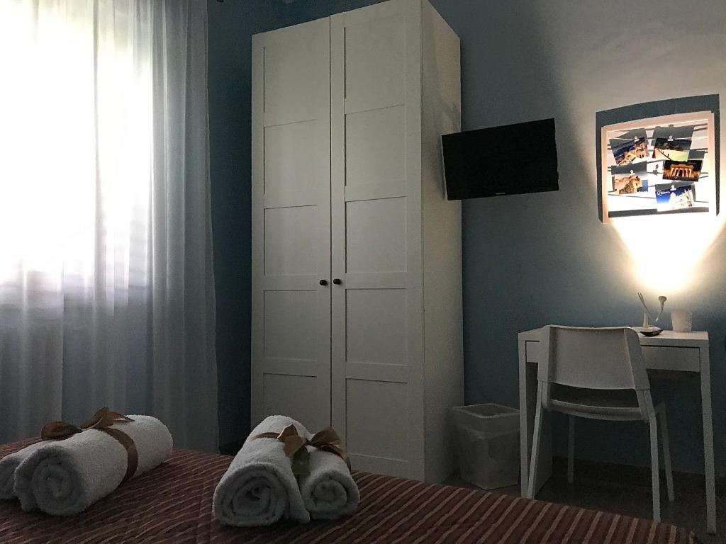 TV a/nebo společenská místnost v ubytování B&B Le Camerette di Edda