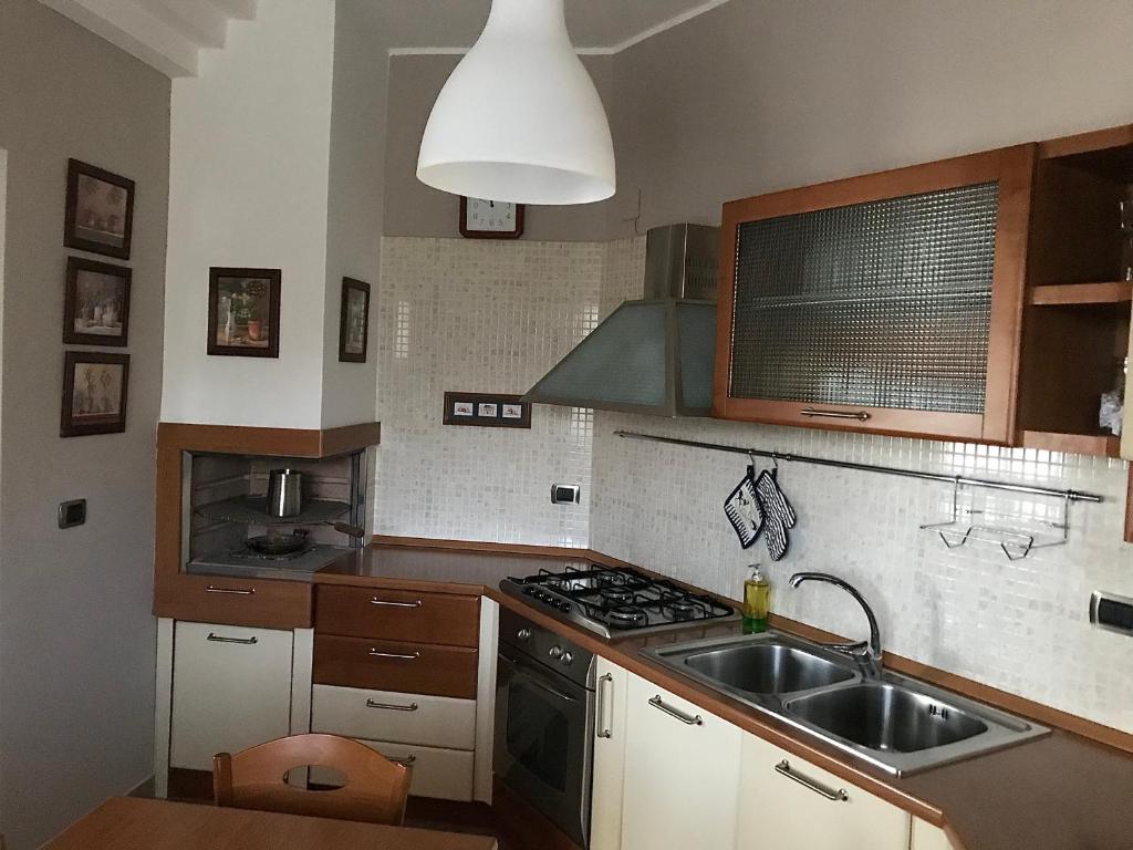 Kuchyň nebo kuchyňský kout v ubytování B&B Le Camerette di Edda