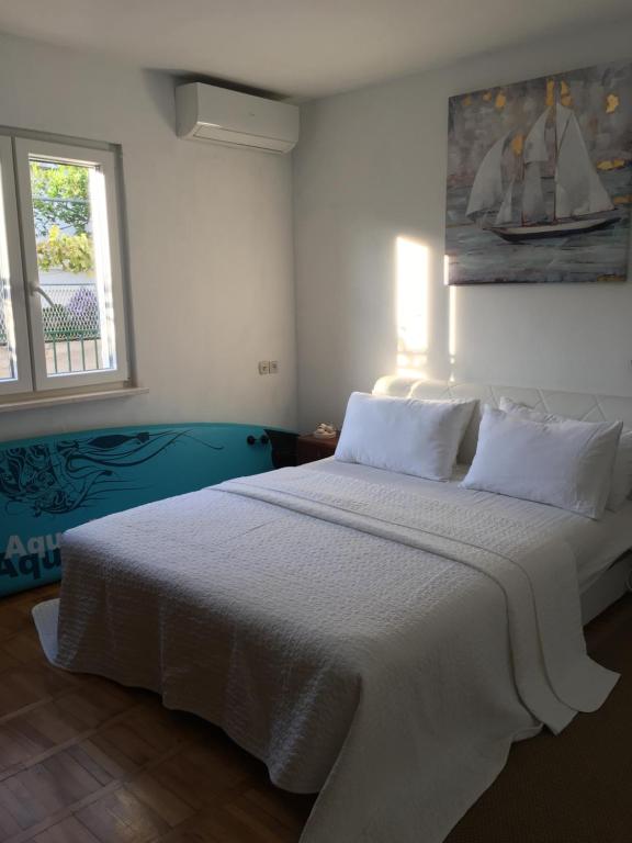 Posteľ alebo postele v izbe v ubytovaní Apartment Marina Komiza