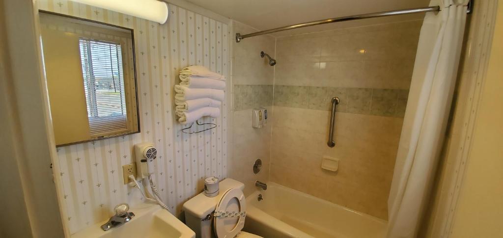 Ein Badezimmer in der Unterkunft Shangri-La Motel