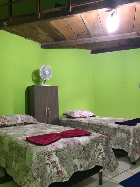 Postel nebo postele na pokoji v ubytování Chalé Raio De Sol